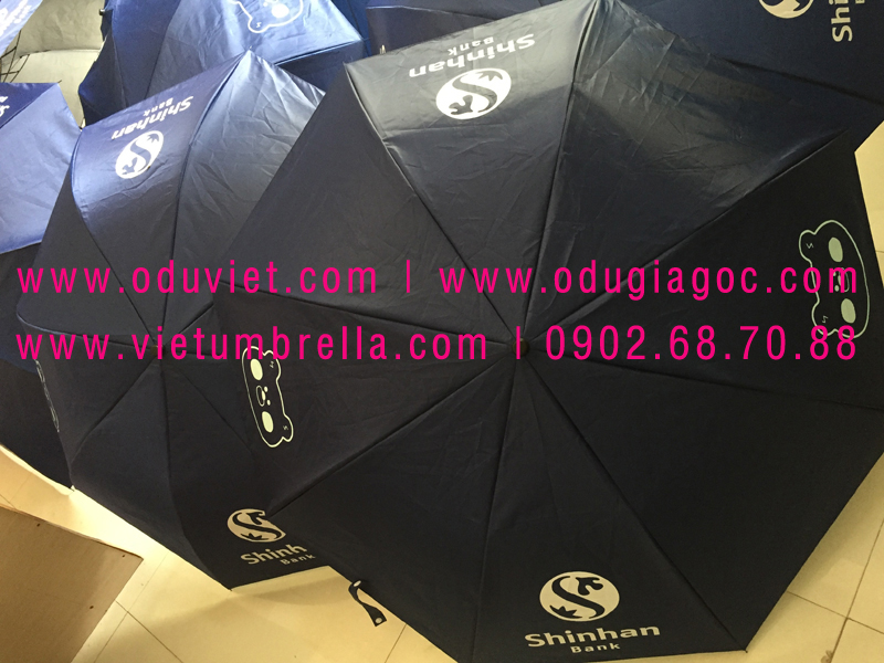 xưởng sản xuất ô dù cầm tay in logo quảng cáo